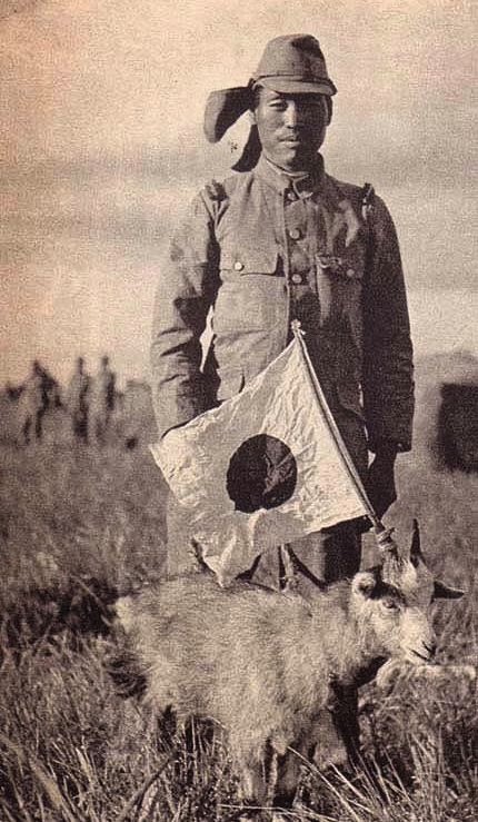 japanese soldier with captured goat.jpg